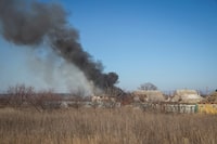 A house burns after a Russian military strike, as Russia's attack on Ukraine continues, near the city of Vuhledar, Donetsk region, Ukraine January 27, 2023. REUTERS/Oleksandr Ratushniak