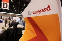 FILE - This Thursday, June 24, 2010, file photo shows the Vanguard booth at an investment conference at the McCormick Center, in Chicago. Nearly every fund made money over the course of 2017, which turned out to be one of the most enjoyable years ever for investors as improvements in corporate profits and economies around the world lifted markets. Vanguard‚Äôs Total Stock Market Index fund, the largest mutual fund by assets, had only a 1 percent loss only six days in 2017, compared to 27 such days in 2016. (AP Photo/M. Spencer Green, File)