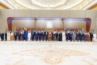 This handout picture provided by the Saudi Press Agency (SPA) on November 11, 2023, shows leaders standing for a group picture ahead of an emergency meeting of the Arab League and the Organisation of Islamic Cooperation (OIC), in Riyadh. Arab leaders and Iran's president are in the Saudi capital on November 11, for a summit meeting expected to underscore demands that Israel's war in Gaza end before the violence draws in other countries. The emergency meeting of the Arab League and the Organisation of Islamic Cooperation (OIC) comes after Hamas militants' bloody October 7 attacks that Israeli officials say left about 1,200 people dead and 239 taken hostage. (Photo by SAUDI PRESS AGENCY / AFP) / RESTRICTED TO EDITORIAL USE - MANDATORY CREDIT "AFP PHOTO / HO/ SAUDI PRESS AGENCY" - NO MARKETING NO ADVERTISING CAMPAIGNS - DISTRIBUTED AS A SERVICE TO CLIENTS (Photo by -/SAUDI PRESS AGENCY/AFP via Getty Images)