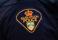 A Saskatoon Police Service patch is shown on an officer in Saskatoon, Sask., on Friday, May 5, 2023. Police in Saskatoon say they were called to a provincial jail in the city on Saturday morning when an inmate was reported to be unresponsive. THE CANADIAN PRESS/Heywood Yu