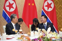 In this photo provided on April 12, 2024, by the North Korean government, Choe Ryong Hae, right, vice-chairman of the central committee of the Workers' Party of North Korea, talks with Zhao Leji, left, chairman of the National People’s Congress of China during a reception, at the Mansudae Assembly Hall in Pyongyang, North Korea, on April 11, 2024. (Korean Central News Agency/Korea News Service via AP)