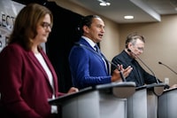 Manitoba provincial party leaders, from left,  Heather Stefanson (PC), opposition leader Wab Kinew (NDP) and Dougald Lamont (Liberal) speak at the Party Leaders Forum – Growing the Economy in Winnipeg Tuesday, September 12, 2023.  THE CANADIAN PRESS/John Woods