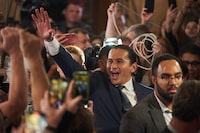 Manitoba NDP Leader Wab Kinew greets supporters after winning the Manitoba provincial election in Winnipeg on Tuesday, Oct. 3, 2023. THE CANADIAN PRESS/David Lipnowski