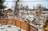 The remnants of a house that was destroyed in an explosion in the Riverdale subdivision of Whitehorse, Yukon is shown on Tuesday, Nov. 14, 2023. An explosion that demolished a home in Whitehorse has killed one person and seriously injured another. THE CANADIAN PRESS/Mike Thomas