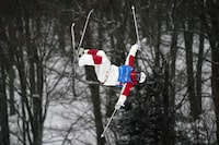 Mikael Kingsbury, of Canada, competes in the men's World Cup freestyle moguls skiing competition, Friday, Jan. 26, 2024, in Waterville Valley, N.H. (AP Photo/Robert F. Bukaty)