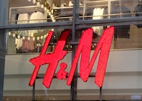 FILE PHOTO: H&M logo is seen on a shop in Riga, Latvia January 30, 2020. REUTERS/Ints Kalnins/File Photo