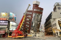 This photo taken by Taiwan's Central News Agency (CNA) on April 3, 2024 shows the damaged Uranus Building in Hualien, after a major earthquake hit Taiwan's east. A major 7.4-magnitude earthquake hit Taiwan's east on the morning of April 3, prompting tsunami warnings for the self-ruled island as well as parts of southern Japan and the Philippines. (Photo by CNA / AFP) / Taiwan OUT - China OUT - Macau OUT / Hong Kong OUT RESTRICTED TO EDITORIAL USE (Photo by -/CNA/AFP via Getty Images)