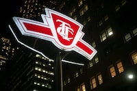 A Toronto Transit Commission sign is shown at a downtown Toronto subway stop, Tuesday, Jan. 24, 2023. A new TTC report says Rogers will look to upgrade parts of the downtown subway network with 5G cell access by this fall. THE CANADIAN PRESS/Graeme Roy