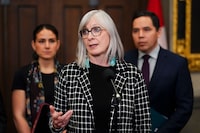 Indigenous Services Minister Patty Hajdu stands with Cassidy Caron, President of the Metis National Council, back left, and Natan Obed, President of the Inuit Tapiriit Kanatami, responds to the Supreme Court of Canada decision regarding An Act respecting First Nations, Inuit and Métis children, youth and families (C-92) during a press conference on Parliament Hill in Ottawa on Feb. 10.