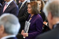 U.S. Rep. Nancy Pelosi (D-CA) holds the image of a Holocaust victim during the U.S. Holocaust Memorial Museum's annual Day of Remembrance ceremony at the Capitol in Washington, U.S. May 7, 2024. REUTERS/Amanda Andrade-Rhoades