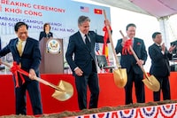 Secretary of State Antony Blinken, center, accompanied by Vietnam's Foreign Minister Bui Thanh Son, left, and Ambassador of the United States to Vietnam Marc Knapper, second from right, participates in a groundbreaking for a new U.S. embassy in Hanoi, Vietnam, Saturday, April 15, 2023.     Andrew Harnik/Pool via REUTERS     TPX IMAGES OF THE DAY