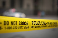 Police tape is shown in Toronto on May 2, 2017. York Regional Police say their homicide unit is investigating after three bodies were found in a home in Richmond Hill. THE CANADIAN PRESS/Graeme Roy