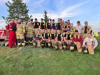 Lakeland College firefighter training students and staff pose in this undated handout photo. THE CANADIAN PRESS/HO, Lakeland College *MANDATORY CREDIT*