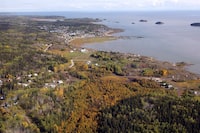 An aerial view of Fort Chipewyan, Alta., on the border of Wood Buffalo National Park is shown on Monday, Sept. 19, 2011. An Alberta First Nation that first brought concerns about the park to UNESCO says a report from the United Nations organization reveals a growing urgency to deal with those problems. THE CANADIAN PRESS/Jeff McIntosh