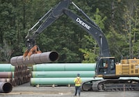 Pipeline pipes are seen at a Trans Mountain facility near Hope, B.C., Thursday, Aug. 22, 2019. THE CANADIAN PRESS/Jonathan Hayward