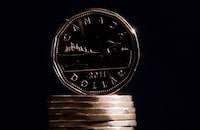 Quebec's minimum wage will increase by 50 cents to $15.75 an hour beginning May 1. Canadian dollars are pictured in Vancouver, Sept. 22, 2011. THE CANADIAN PRESS/Jonathan Hayward