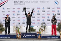 Winner Breeana Walker, center, of Australia, celebrates on the podium with second place finisher Elana Meyers Taylor, of the United States,left, and third place finisher Cynthia Appiah, of Canada, after the monobob competition as a World Cup event in Lake Placid, N.Y., Friday, March 22, 2024. (AP Photo/Seth Wenig)