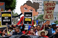 FILE PHOTO: Hotel workers march and protest as they continue their strike in Los Angeles, California, U.S., October 25, 2023. REUTERS/Mike Blake     TPX IMAGES OF THE DAY/File Photo