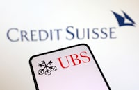 FILE PHOTO: UBS Group and Credit Suisse logos are seen in this illustration taken March 18, 2023. REUTERS/Dado Ruvic/Illustration
