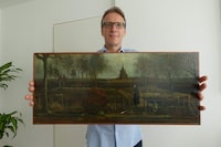 An handout picture released by Dutch art detective Arthur Brand shows a portrait of him posing with the painting title "Parsonage Garden at Nuenen in Spring", painted by Vincent van Gogh in 1884, at his home in Amsterdam on September 11, 2023. Brand has recovered a precious Vincent van Gogh painting that was stolen from a museum in a daring midnight heist during the coronavirus lockdown three-and-a-half years ago. Brand, dubbed the "Indiana Jones of the Art World" for tracing a series of high-profile lost artworks, told AFP that confirming the painting was the stolen Van Gogh was "one of the greatest moments of my life." (Photo by Handout / ARTHUR BRAND / AFP) / RESTRICTED TO EDITORIAL USE - MANDATORY CREDIT "AFP PHOTO /Arthur Brand " - NO MARKETING NO ADVERTISING CAMPAIGNS - DISTRIBUTED AS A SERVICE TO CLIENTS (Photo by HANDOUT/ARTHUR BRAND/AFP via Getty Images)
