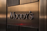 FILE PHOTO: Signage is seen outside the Moody's Corporation headquarters in Manhattan, New York, U.S., November 12, 2021./File Photo