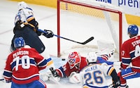 St. Louis Blues' Alexey Toropchenko (13) scores against Montreal Canadiens goaltender Jake Allen during first period NHL hockey action in Montreal, Sunday, Feb. 11, 2024. THE CANADIAN PRESS/Graham Hughes