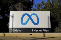 FILE - Meta's logo can be seen on a sign at the company's headquarters in Menlo Park, Calif., Nov. 9, 2022. Russia has added the spokesman of U.S. tech giant Meta, which owns Facebook and Instagram, to a wanted list, according to an online database maintained by the country’s interior ministry. Russian state agency Tass and independent news outlet Mediazona first reported on Andy Stone’s inclusion on the list on Sunday. (AP Photo/Godofredo A. Vásquez, File)