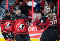 Team Canada's Jocelyne Larocque celebrates her goal past the U.S.A. with goaltender Embrace Maschmeyer during first period of Women's Rivalry Series hockey action in Vancouver, Wednesday, February 5, 2020. THE CANADIAN PRESS/Jonathan Hayward