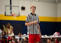 Gradey Dick of the Toronto Raptors referees a scrimmage between Raptors Basketball Academy campers at the Humber College North Campus Athletics Building in Toronto  on Friday, July 28, 2023.  THE CANADIAN PRESS/ Tijana Martin
