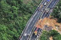In this photo released by Xinhua News Agency, an aerial photo shows rescuers work at the site of a collapsed road section of the Meizhou-Dabu Expressway in Meizhou, south China's Guangdong Province, Wednesday, May 1, 2024. A section of a highway collapsed early Wednesday in southern China leaving more than a dozen of people dead, local officials said, after the area had experienced heavy rain in recent days. (Xinhua News Agency via AP)