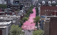 Claude Cormier, a celebrated Canadian landscape architect who helped design some of Montreal and Toronto's best-known public spaces, has died at 63. Strings of pink plastic balls form a ribbon along a section of Ste-Catherine Street, commonly called the Village, in Montreal, Thursday, June 23, 2016. THE CANADIAN PRESS/Paul Chiasson