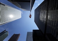 Statistics Canada will release its report on how the economy fared in April when it releases its reading of gross domestic product for the month. The Bay Street Financial District is shown with the Canadian flag in Toronto on Friday, August 5, 2022. THE CANADIAN PRESS/Nathan Denette