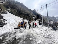 In this handout photo released by the Indian Army, soldiers clear snow from an avalanche near Nathu La mountain pass in India's Sikkim state, Tuesday, April, 4, 2023. An avalanche swept away a group of tourists in the Himalayas in northeastern India on Tuesday, killing at least six and injuring 11 others, officials and news reports said. (Indian Army via AP)