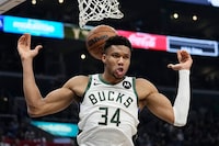 Milwaukee Bucks forward Giannis Antetokounmpo dunks during the second half of an NBA basketball game against the Los Angeles Clippers Friday, Feb. 10, 2023, in Los Angeles. (AP Photo/Mark J. Terrill)