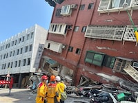 Firefighters work at the site where a building collapsed following the earthquake, in Hualien, Taiwan, in this handout provided by Taiwan's National Fire Agency on April 3, 2024. Taiwan National Fire Agency/Handout via REUTERS  ATTENTION EDITORS - THIS IMAGE WAS PROVIDED BY A THIRD PARTY. NO RESALES. NO ARCHIVES.