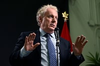 <p>Conservative Leadership candidate Jean Charest answers questions from reporters after the third debate of the 2022 Conservative Party of Canada leadership race, in Ottawa, on Wednesday, Aug. 3, 2022. THE CANADIAN PRESS/Justin Tang</p>