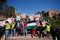FILE - Demonstrators gather on the UCLA campus, after nighttime clashes between pro-Israel and pro-Palestinian groups, Wednesday, May 1, 2024, in Los Angeles. (AP Photo/Jae C. Hong, File)