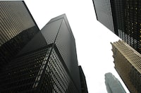 File photos of various Bank Buildings in Downtown Toronto.  On left is TD Building, center is CIBC and gold one is Royal Bank.
Pictures taken on Dec.31/03
Photo by Tibor Kolley