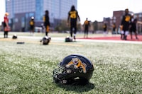 The Hamilton Tiger-Cats will add Hall of Famers Mike Walker and Bernie Custis to their Wall of Honour this season. Members of the Tiger-Cats run though a drill during the opening day of CFL training camp at Ron Joyce Stadium in Hamilton, Ont., Thursday, May 19, 2022. THE CANADIAN PRESS/Nick Iwanyshyn