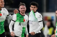 Liverpool's Luis Diaz celebrates after scoring his side's first goal during the English Premier League soccer match between Luton Town and Liverpool, at Kenilworth Road, in Luton, England, Sunday, Nov. 5, 2023. (Alastair Grant)