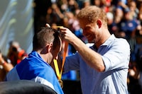 FILE PHOTO: Britain's Prince Harry, Duke of Sussex attends the cycling medal ceremony at the 2023 Invictus Games, in Duesseldorf, Germany September 15, 2023. REUTERS/Piroschka Van De Wouw/File Photo