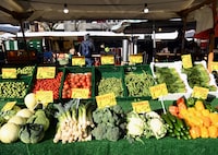 A general view of a fruit and vegetable stand on a weekly market in Berlin, Germany, March 14, 2020.  REUTERS/Annegret Hilse