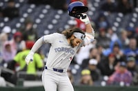 Toronto Blue Jays' Bo Bichette reacts after he struck out during the fifth inning of a baseball game against the Washington Nationals, Saturday, May 4, 2024, in Washington. Bichette was ejected from the game. (AP Photo/Nick Wass)