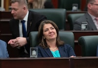 Alberta Premier Danielle Smith looks to the gallery as the 2024 budget is delivered in Edmonton, Thursday, Feb. 29, 2024. Smith says Albertans need to get on board with the direction her government is taking on fiscal restraint and saving for the future.THE CANADIAN PRESS/Jason Franson.