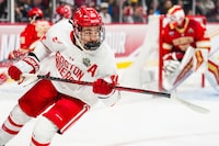 Apr 11, 2024; Saint Paul, Minnesota, USA; Boston U. defenseman Lane Hutson (20) in the semifinals of the 2024 Frozen Four college ice hockey tournament during the first period against the Denver at Xcel Energy Center. Mandatory Credit: Brace Hemmelgarn-USA TODAY Sports