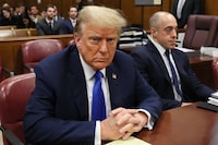 Republican presidential candidate and former U.S. President Donald Trump sits in the courtroom as his criminal trial over charges that he falsified business records to conceal money paid to silence porn star Stormy Daniels in 2016 continues, at Manhattan state court in New York City, U.S., April 22, 2024. REUTERS/Brendan McDermid/Pool