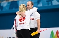 Canada’s Jennifer Jones and Brent Laing hug at the World Mixed Doubles Curling Championship Gangneung, Korea on Wednesday, April 26, 2023. The husband-and-wife duo qualified for the semifinal after wrapping up first place in their pool at the world mixed doubles curling championship on Thursday. THE CANADIAN PRESS/HO-World Curling Federation-Eakin Howard **MANDATORY CREDIT** 

