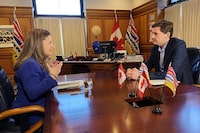 Finance Minister and Deputy Prime Minister Chrystia Freeland meets with B.C. Premier David Eby at the legislature in Victoria on Monday, March 11, 2024. THE CANADIAN PRESS/Dirk Meissner