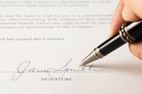 File Number: 2141862
Signing a contract.
Close up of a hand signing a document.  Please note that the signature is fictitious.
Credit:  iStockphoto

(Royalty-Free)