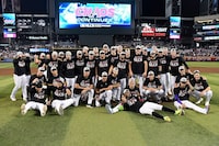 PHOENIX, ARIZONA - OCTOBER 11: The Arizona Diamondbacks pose for photos after beating the Los Angeles Dodgers 4-2 in Game Three of the Division Series at Chase Field on October 11, 2023 in Phoenix, Arizona. (Photo by Norm Hall/Getty Images)